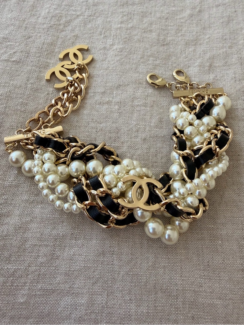 ✨CHANEL Gold, Black & Pearl Braided Logo Bracelet🖤 - Picture 3 of 12